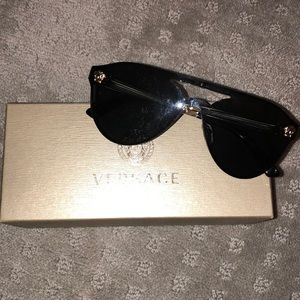 Versace authentic sunglasses. Box no holder.